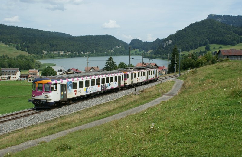 An ex. MTHB ABDe 4/4 with his Bt between Les Charbonires and Schey in the beautiful Valle  de Joux.
16.08.2009