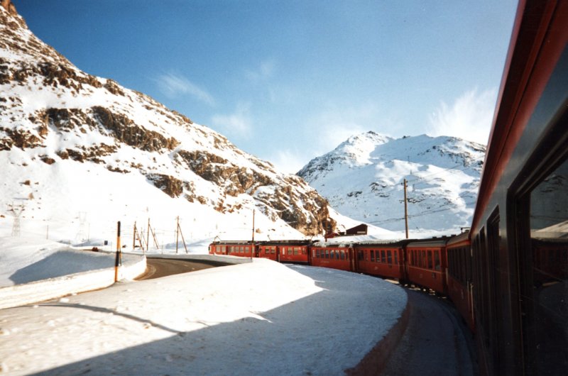 Bernina train with RhB ABe 4/4 47 on 04.01.1992 at Bernina Pass.