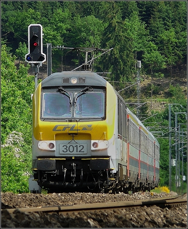 Close-up of 3012 with Belgian I 6 wagons as IR Luxembourg City-Liers taken near Wilwerwiltz on May 25th, 2008.