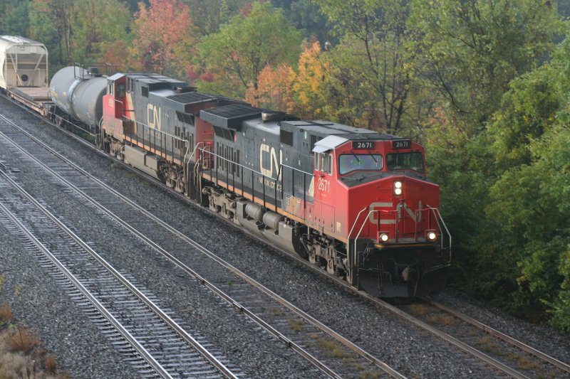 Freight train with two Dash-9 C44-9W 2671 + 2668 on 03.10.2009 at Bayview Junction near Hamilton. 
