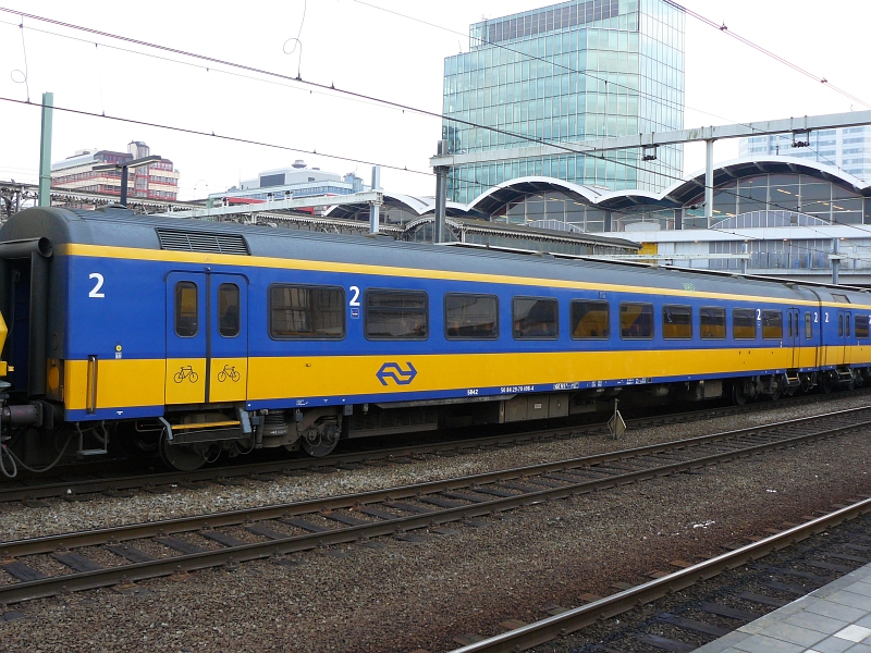 Intercity coach second class with at one side of the coach extra room for bicycles. Typ Bf (B stands for second class and f stand for fiets, which is dutch for bicycle) number 50 84 29 70 498-4 in Utecht Centraal Station 23-10-2009.