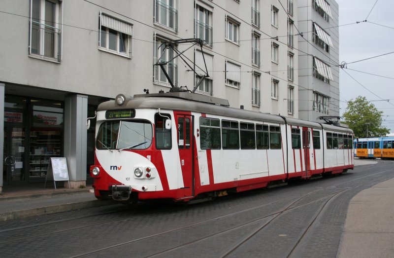 Line 21 towards Handschuhsheim with OEG 107 (GT8 DUEWAG) on 13.07.2009 in front of Heidelberg main station. 

