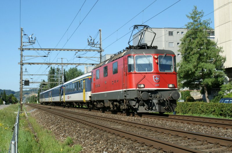 Re 4/4 II with a local train to Olten by Grenchen. 
26.07.2009