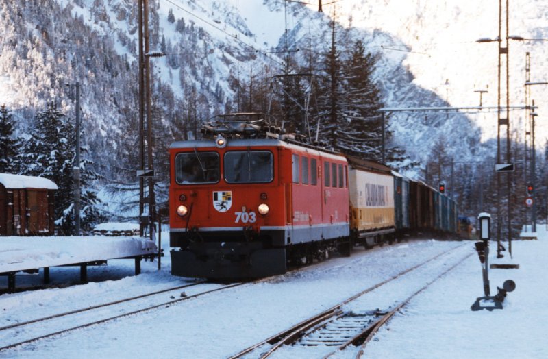 RhB Ge 6/6 703 with freight train on 05.01.1995 at Preda.
