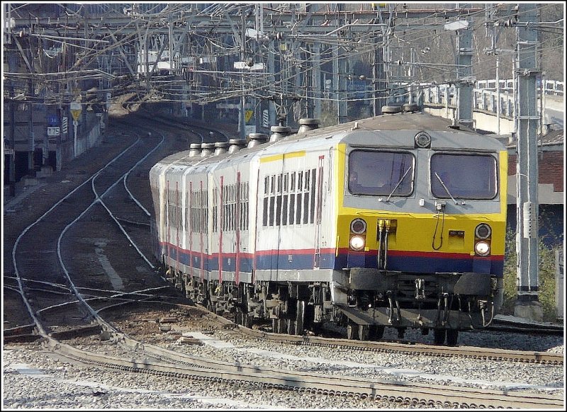 The IR Quivrain-Lige Guillemins headed by an M 4 control car arrives at its final destination an March 30th, 2009.