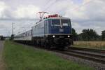 TRI's  E11 112 hauls an RB37 through Kaarst towatrd Neuss Hbf on 23 July 2025.