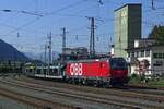 On 17 September 2019 ÖBB 1293 038 hauls an LGAG (empty automotive train) through Kufstein.