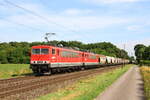 Locomotive 155167 from Leipziger Dampf KulTour hauling locomotive 155 124 and silos, in Bösinghoven, 8/7/2025.