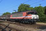 Carying a slightly battered paint job, RFO 1831 (ex NS 1631, ex-NS Reizigers 1831, ex LOCON 9904) hauls a block train out of Oss on 11 June 2025.