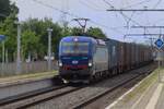 SBBCI/HUPAC 193 490 hauls a container train through Blerick on 7 August 2025.