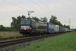 Ecco Rail X4E-610 hauls an intermodal train through Kaarst on 8 August 2025.