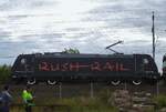 Rush Rail 185 413 'GRUMPY'passes your photographer and other enthousiasts at Gävle on 12 September 2015 by surprise, making us for a short moment also a bit 'GRUMPY'. The Swedish design number for Class 185 is Class 241.
