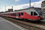 MAV 415 052 stands in BUdapest-Delí on 13 May 2018. These EMUs were delivered in this red, white and grey colours as Class 5341, but all have changed to the new yellow, blue and white of the MAV. 