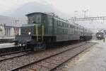On a very rainy 19 September 2023, SBB Historic 11801 catches the rain at Erstfeld during the Gotthard Railway Days.