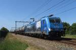 LTE 186 942 hauls a tank train through Alverna on 1 June 2023.