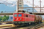 ÖBB 1110.505 hauls a tank train into the Swiss-Austrian border station Buchs (SG) on 17 June 2001.