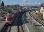 The ÖBB 1016 038 with a RE is arriving at Lindau.