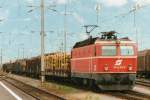 BB 1044 094 with -again- a wood snippets train prepares to leave Buchs SG on 1 June 2001.