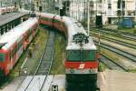 Scanned picture of 1044 060 entering Salzburg Hbf on 29 May 2004.