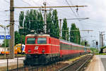 ÖBB 1044 026 calls at Bruck an der Leitha with an EC service from Budapest and Bratislava on 23 May 2002.