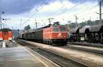 1044.048 with goods train at Schrding, May 3rd, 1988.