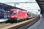 Norbert -alias 1116 040- hauls a train of automotives through Breclav on 2 June 2015.