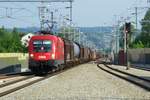 On 9 May 2018 ÖBB 1116 120 with freight speeds through Schärding.