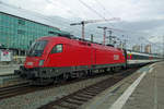 EC to Zürich HB via Singen quits Stuttgart Hbf on 3 January 2020, hauled by 1116 092.