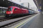 Who's  afraid of Red, White and Blue? On the evening of 27 August 2021 ÖBB 1116 042 (Red) hauls an EuroCity of MAV coaches (White and Blue) into Wien Hbf.