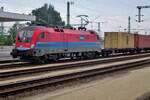 On 6 May 2016 RCH 1116 011 hauls a container train through Kelenföld towards Ferençvaros, the biggest shunting yard in HUngary.
