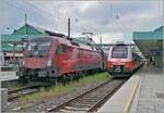 The ÖBB 1116 224 has arrived in Bregenz with its RailJet, while on the adjacent track the ÖBB ET 4748 510-6 is waiting to depart for St Margrethen SG.  
April 19, 2026