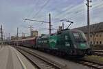 Electric locomotive 1116 248 is pushing its Railjet train out of Linz station towards Vienna.