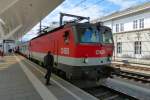 1144 036 with IC 690 to Villach at 12.9.15. Salzburg Mainstation.