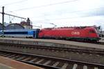 ÖBB 1216 227 stands at Praha hl.n. on 6 April 2017.