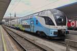 Electric multiple unit of the Westbahn stands at Vienna West Station.