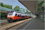 The ÖBB 4748 002-4 is waiting in Bregenz his departur to St Margrethen.