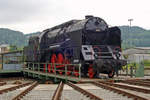 In the 1930s the Austrian railways BBÖ used thirteen Class 214 steam locos for the fast trains Salzburg-Vienna. After the nazi-Anschlüss of 1938, these became Class 12. When from 1935 the Romanian railways CFR needed fast passenger steam locos, they ordered 79 engines of a slightly modified Class 214/12 design. Of these CFR machines, 142.063 was bought by ÖGEG (Austrian Railway History Society) and masqueraded as 12.14 enjoys now a lease of life at the Lokpark Ampflwang, where she was photographed on 27 May 2012.