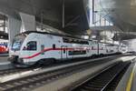 Multiple Unit 4110 112-8 is at the station in Vienna on the platform.