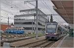 Two AVA BDWM ABe 4/8 'Diamant' have arrived in Bremgarten. In the background is the BD BDe 4/4 No. 10 'Mutschälle-Zähni,' which will be making several trips during the Christmas market weekend. December 6, 2024