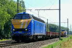 The Infrabel 6323 with some flat wagons and the 6309 on route to the port of Antwerp.