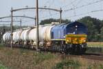 RailTraxx 266 009 hauls a tank train through Hulten on 2 September 2022.