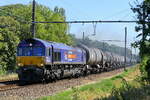 La HSL Belgium GmbH 266 066 (PB15) tractant un lourd convoi-citerne vers le port d'Anvers.