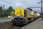 On 23 August 2013 NMBS 7856 hauls a mixed freight through Antwerpen-Noorderdokken.