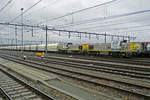 On 18 March 2017 it rained when SNCB 7786 eneterd Venlo with the lime train from Yves-Gomezée.