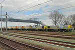 Lime slurry train with 7785 leading is about to leave Lage Zwaluwe on 17 April 2015.