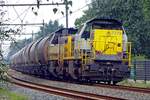 NMBS 7779 banks a cereals train through Wijchen on 10 July 2019.