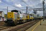 One of four zinc ore trains -this one with 7771 at the reins- passes through Antwerpen-Berchem on 19 November 2016.