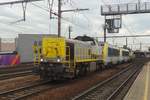 NMBS 7743 hauls some locos through Antwerpen-Berchem on 21 May 2014.