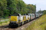 The Lineas 7768 double traction with the 7812 for this heavy mixed freight train (steel rolls and tank wagons) on route to the port of Antwerp.