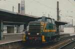 Scanned photo og NMBS/SNCB 8002 running light through Bruxelles-Midi on 27 December 1996.